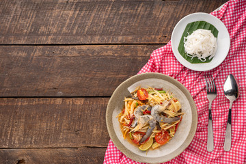 Som Tam Thai -Ingredients Papaya Salad Thai Food Style on wooden table background. Thai Food Concept. Top View