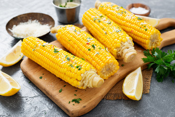 Steamed sweet corn with greens and grated parmesan.