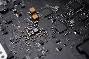 A black colour waterproof Printed Circuit Board with CPU, SMD & IC mounted part on board