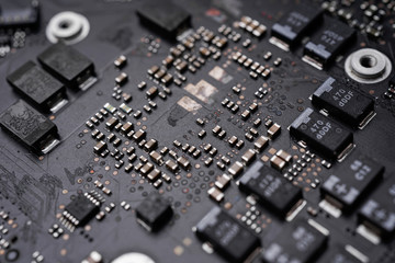 A black colour waterproof Printed Circuit Board with CPU, SMD & IC mounted part on board