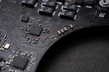 A black colour waterproof Printed Circuit Board with CPU, SMD & IC mounted part on board