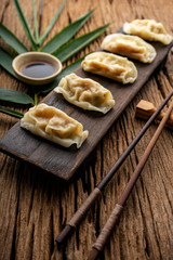 Dim sum, Dim Sum on the wooden table, top view and space for text input , Dim Sum (Chinese food) in steamed bamboo
