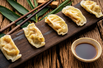 Dim sum, Dim Sum on the wooden table, top view and space for text input , Dim Sum (Chinese food) in steamed bamboo