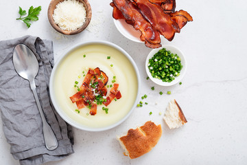 Potato cream soup with bacon, green onion and cheese.