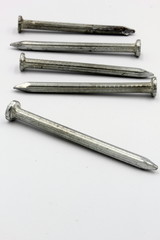 set of nails on white background