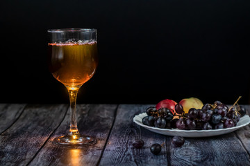 Amber wine. Wine in a glass. Traditional Georgian wine according to ancient technology. Close up