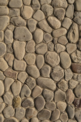 Abstract nature pebbles..Natural pebble stone background. .Background of natural pebbles bonded with cement mortar.