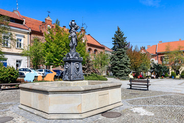 MYSLENICE, POLAND - APRIL 21, 2019: The fountain on the main market square