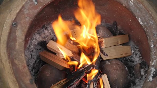 Flames in a firepit in slow motion