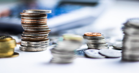 baht coins stacked on each other in different positions