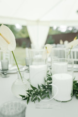 Aroma candles and the lily on the wedding table