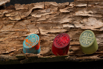 Chocolate color bonbon collection on wood bark