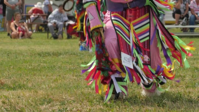 Native american men dance at a pow wow
