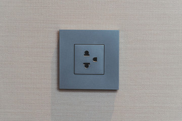 electric plug gray color with copy space