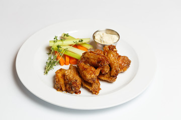 grilled chicken wings with herbs and a asparagus