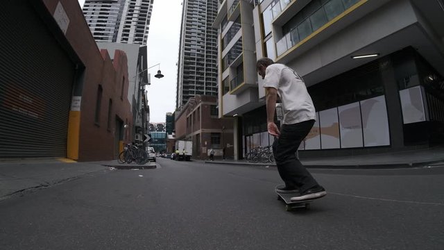 Trick over sewer manhole hatch cover in city street