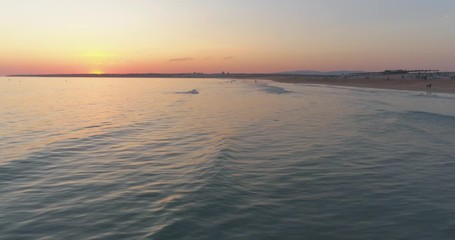 Aerial Sunset Seascape of Salgados Beach in Albufeira, Algarve, Portugal.