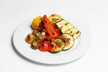 grilled vegetables in assortment on white background