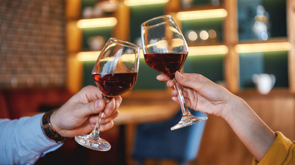 Romantic vibes. Young couple is celebrating anniversary in restaurant