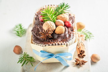 Delicious gingerbread nuts for Christmas decorated with spruce