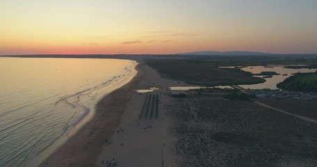 Aerial Sunset Seascape of Salgados Beach in Albufeira, Algarve, Portugal.