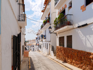 Beautiful narrow street in the old town of Altea. Costa Blanca, Spain.