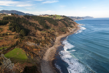 Geological rock formations and cliffs on the Flysch route. Cantabrian Sea. In Vizcaya, Basque Country. Spain