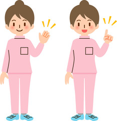 手を挙げて案内するピンクの制服の女性