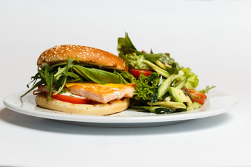 burger with salmon and vegetables