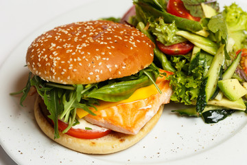 burger with salmon and vegetables