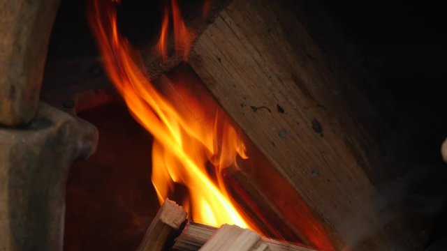 Wood burning in a chiminea in slow motion
