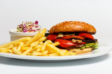 vegetarian burger with a potatoes and salad