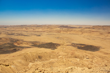 Fototapeta na wymiar top view aerial landscape photography of desert scenery wasteland valley to horizon line