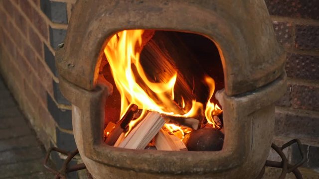 Wood burning in a chiminea