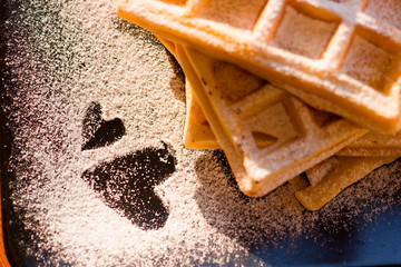 Viennese waffles with icing sugar