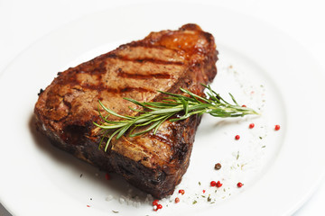 beef rib eye on a white plate