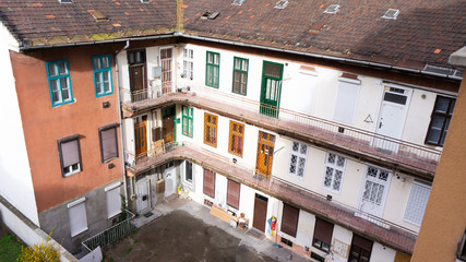 the courtyard of an old condominium