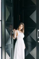 Light portraits of a woman in a restaurant. Beautiful girl blogger in the Park.