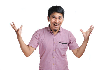 Image of excited expression young asian man standing looking camera
