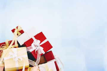 Gifts with ribbon bow on beautiful background, Christmas and Happy New year concept