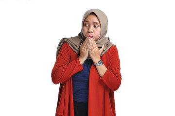 Attractive shocked expression of young Asian woman standing with hijab