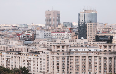 Naklejka premium Cityscape of old part of Bucharest, with many worn out buildings, as seen from the Palace of Parliament