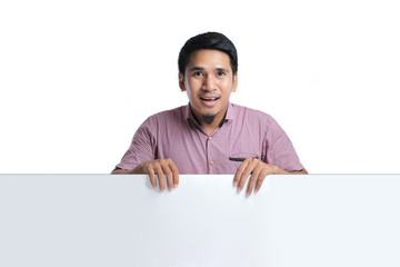 Nice Happy male Smiling And Holding A Blank Placard