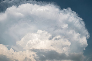 View of the main tower and spreading anvil of a developing thunderstorm
