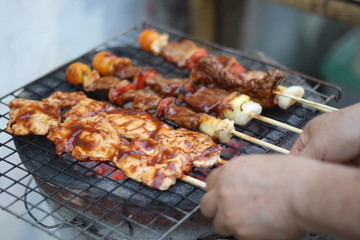 closeup​ BBQ.​ BBQ on the charcoal stove.