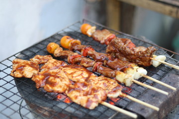 closeup​ BBQ.​ BBQ on the charcoal stove.