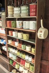 Classic cups on shelf