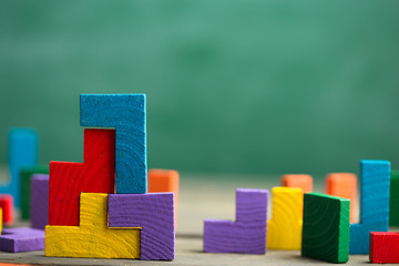 Creative solution for idea - business concept, jigsaw puzzle on the blackboard