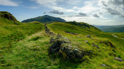 Views towards Eskdale from the summit of Hardknott Pass, Lake District, UK
