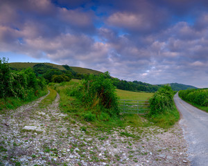 Summer sunrise on the South Downs near Didling, West Sussex.